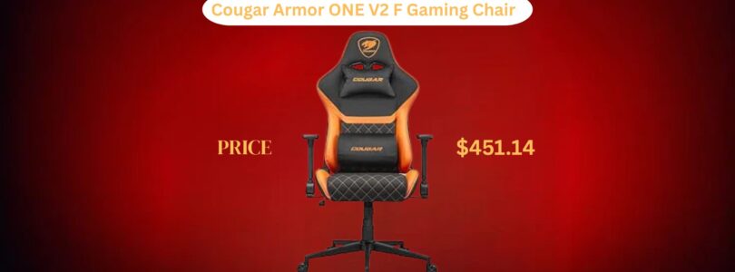 Ergonomic black and orange gaming chair with high back, adjustable footrest, and lumbar support