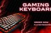 TECKNET RGB backlit gaming keyboard with whisper quiet switches and ergonomic wrist rest in black.